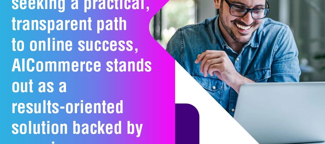 A smiling man working on a laptop in a modern office.